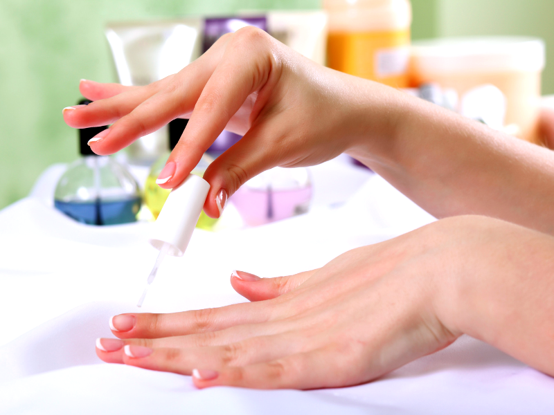 How do you apply base coat nail polish