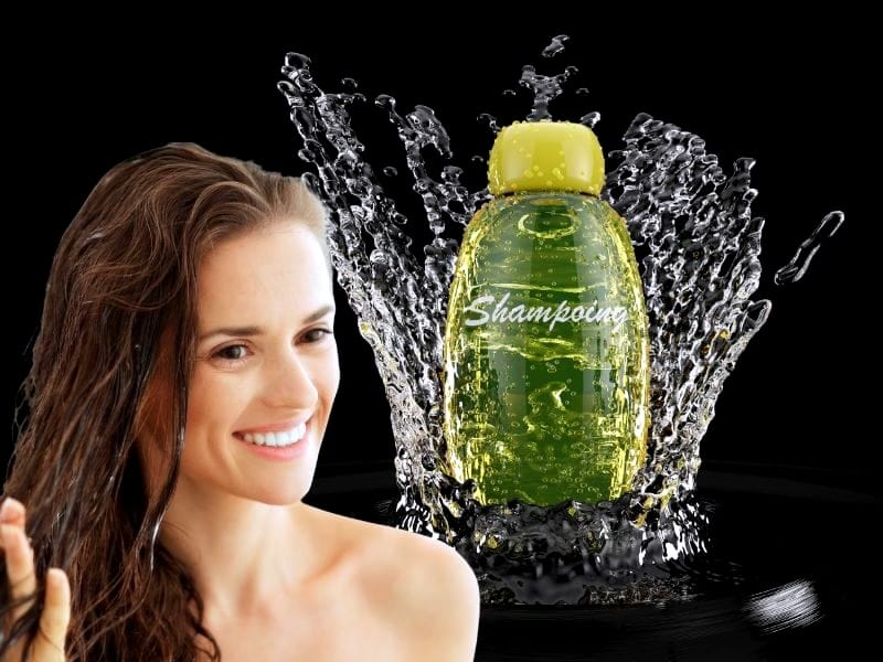 Smiling woman with wet hair next to a green shampoo bottle splashing water, promoting no toxic hair products.