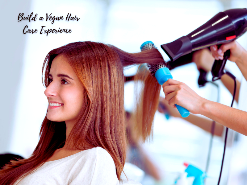 Hair stylist blow-drying a client's hair, emphasizing the use of vegan hair products for a sustainable salon experience.