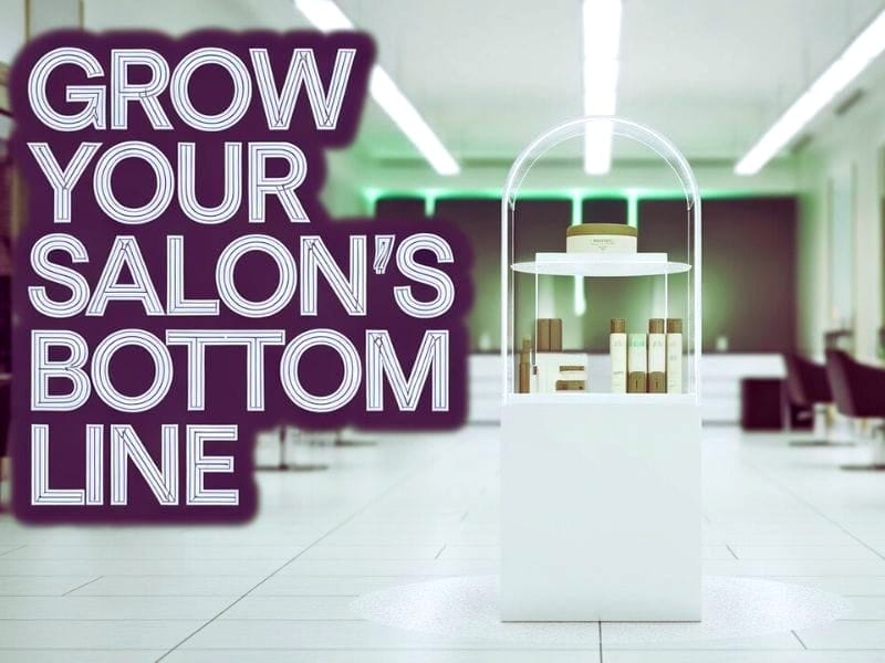 Elegant salon display featuring premium haircare products with text 'Grow Your Salon's Bottom Line' to boost revenue.