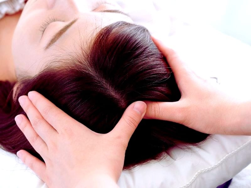 Scalp massage therapy for healthier hair and dandruff prevention, promoting relaxation and improved scalp circulation.