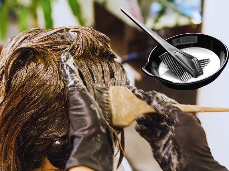 Hair dye application at a salon with a brush and mixing bowl, showing professional hair coloring tools and chemicals used.