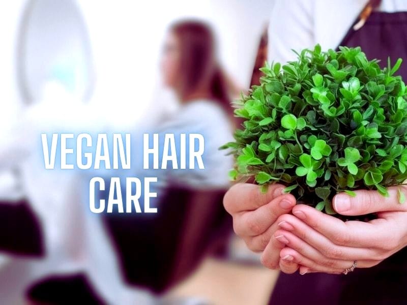 Vegan hair care concept with a salon professional holding a green plant, symbolizing natural and cruelty-free hair products.