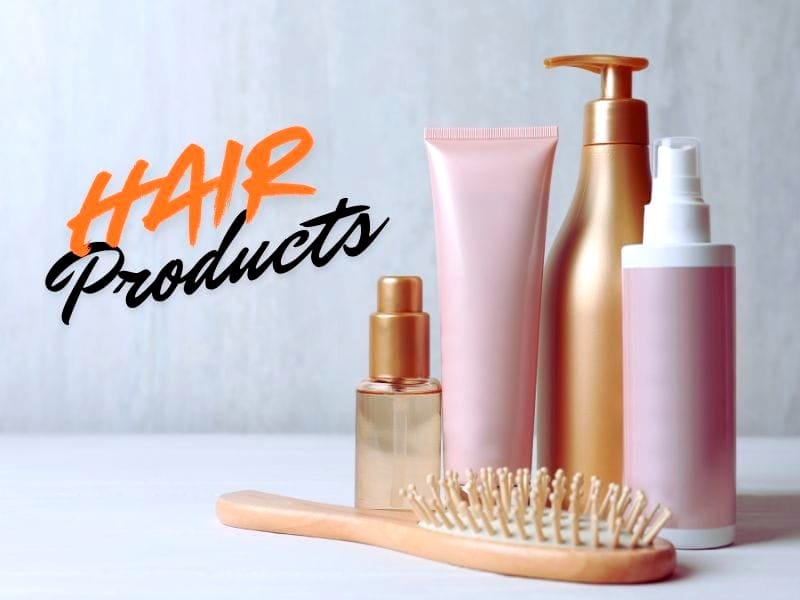 Hair products for salon success: Luxury hair care bottles with a brush, boosting salon revenue through retail sales.