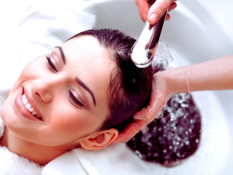 Salon-exclusive dandruff treatment for a refreshed, flake-free scalp, with a relaxing hair wash experience.