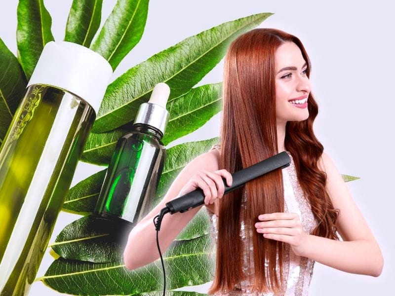 A woman with long, straight hair uses a flat iron, surrounded by green leaves and natural hair products.