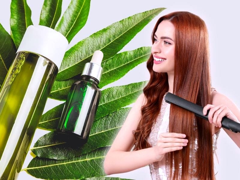 Smiling woman straightening shiny hair with natural oils on green leaves, promoting healthy hair care.